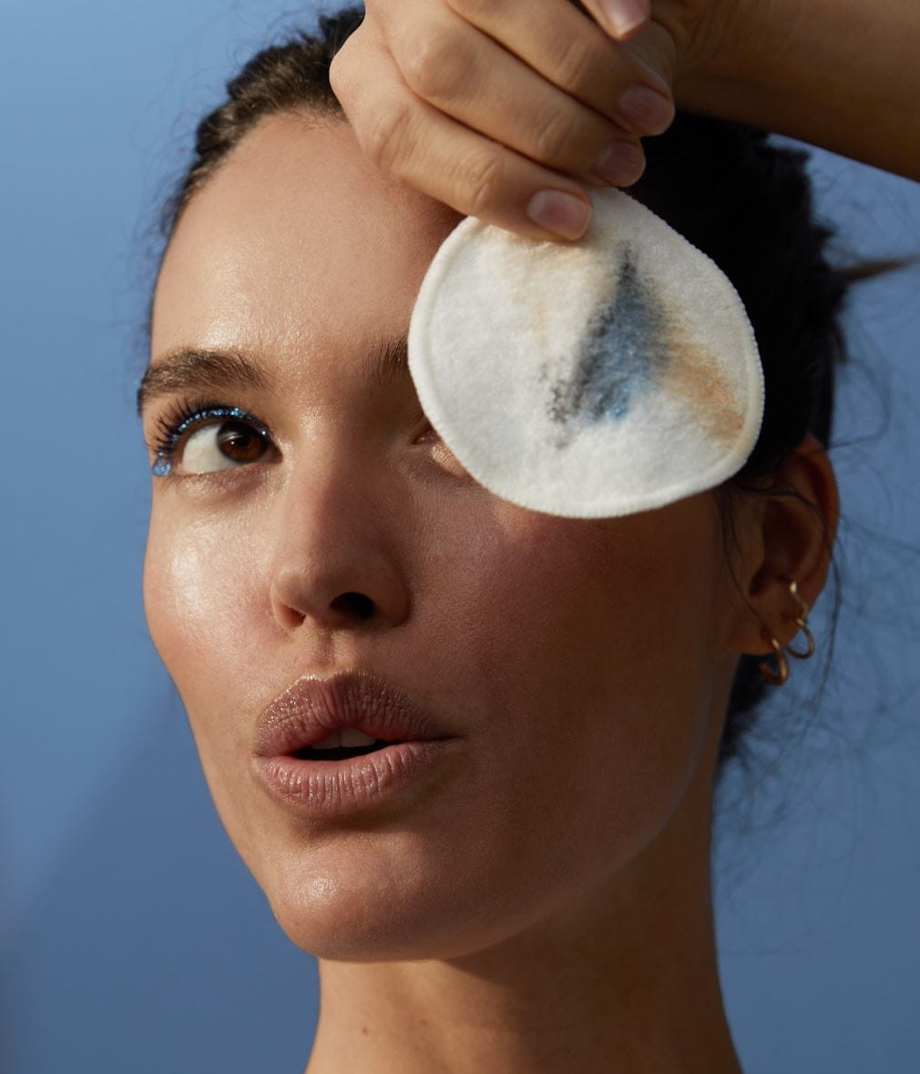 woman applying Micellar water brightening day