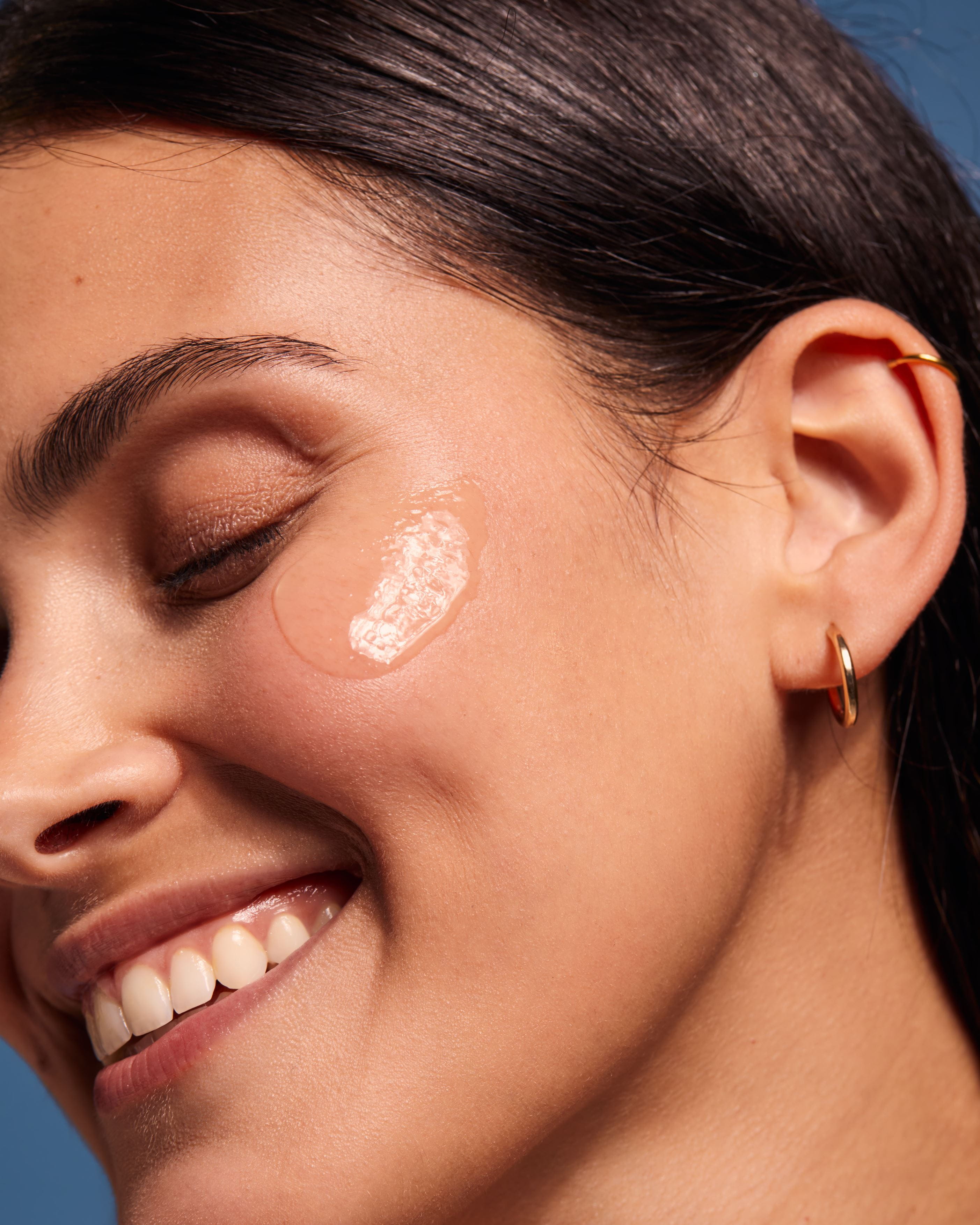 woman with sunscreen on her face