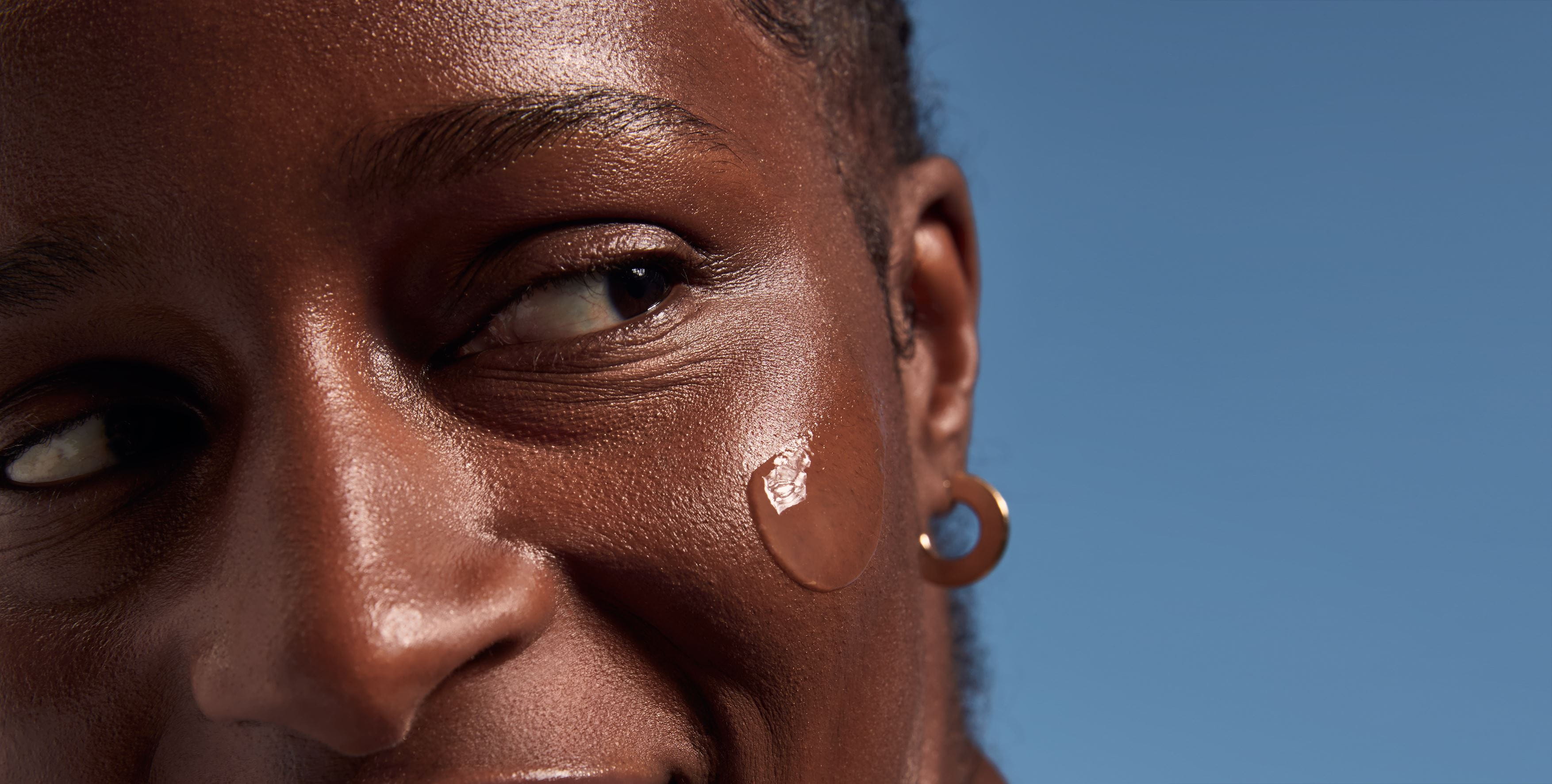 woman with sunscreen on face