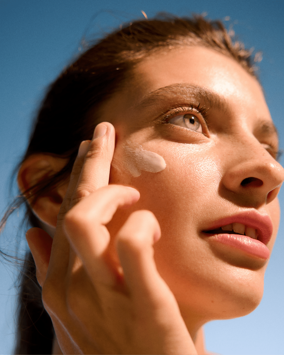 woman using a Nivea beauty mask 