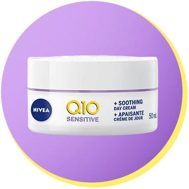 A Nivea Q10 Sensitive Soothing  Day Cream product against a purple background.