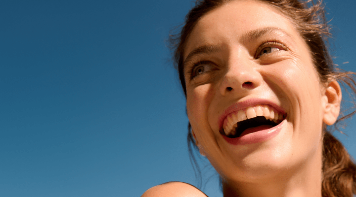 woman smiling with clear skin