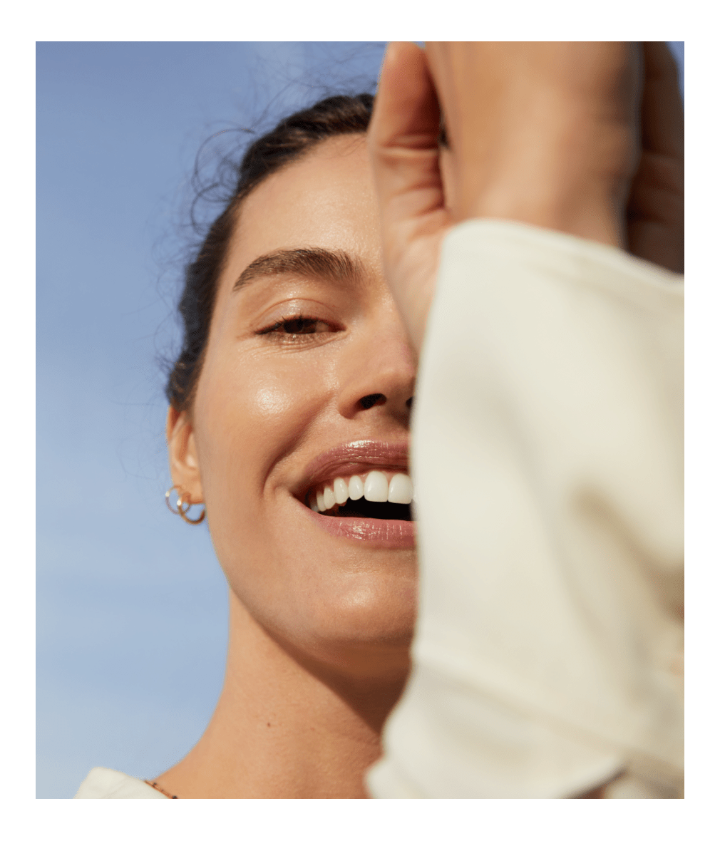 woman holding micellar water serum for bright skin