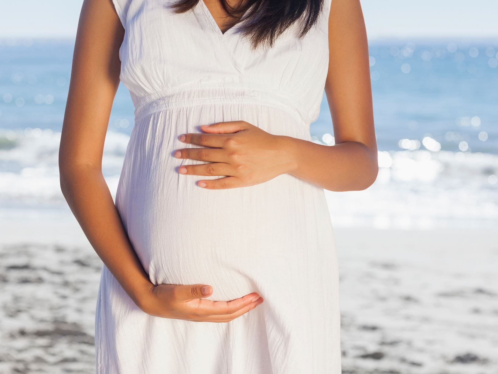 pregnant-woman-in-white-dress