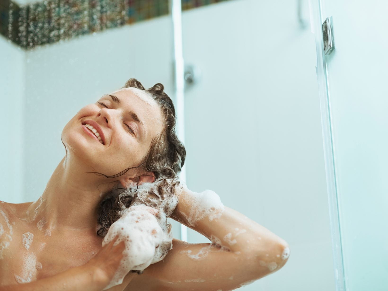 happy-woman-washing-hair