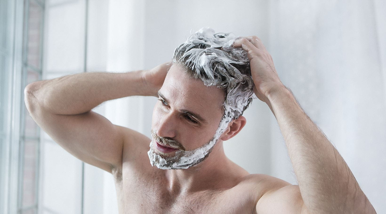 man shaving after the shower