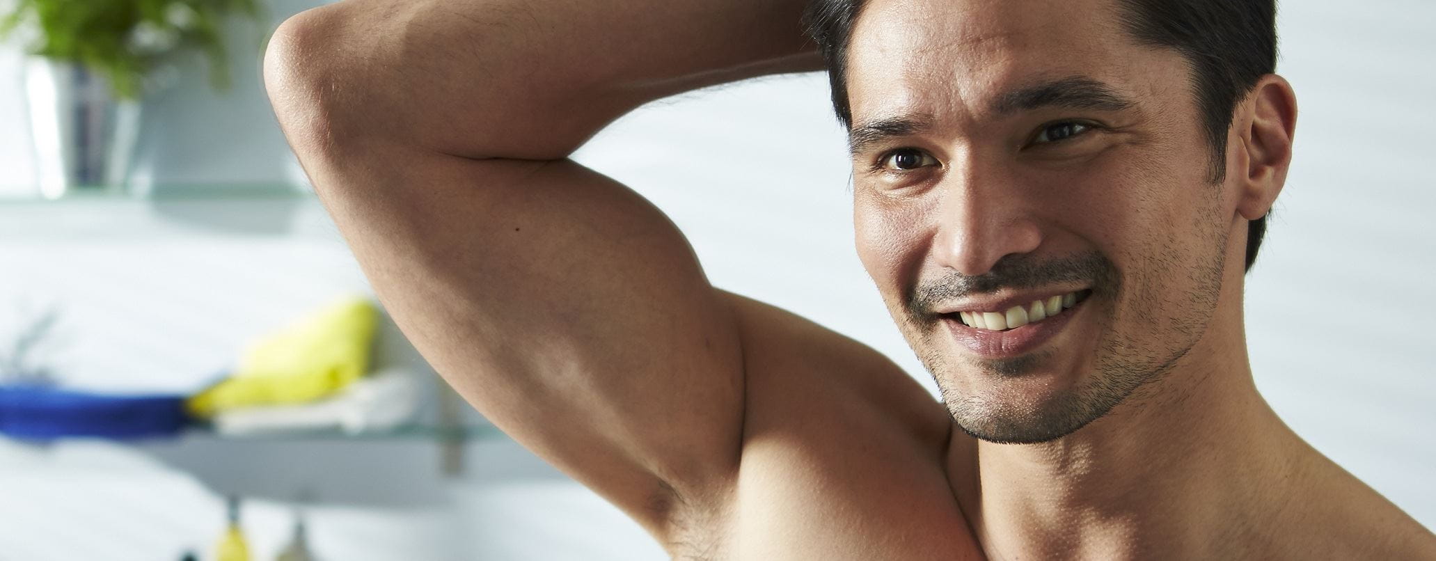 The manscaping guide with man smiling