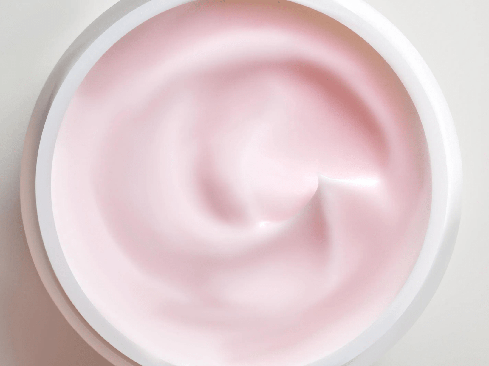 rose water face cream by nivea surrounded by rose petals