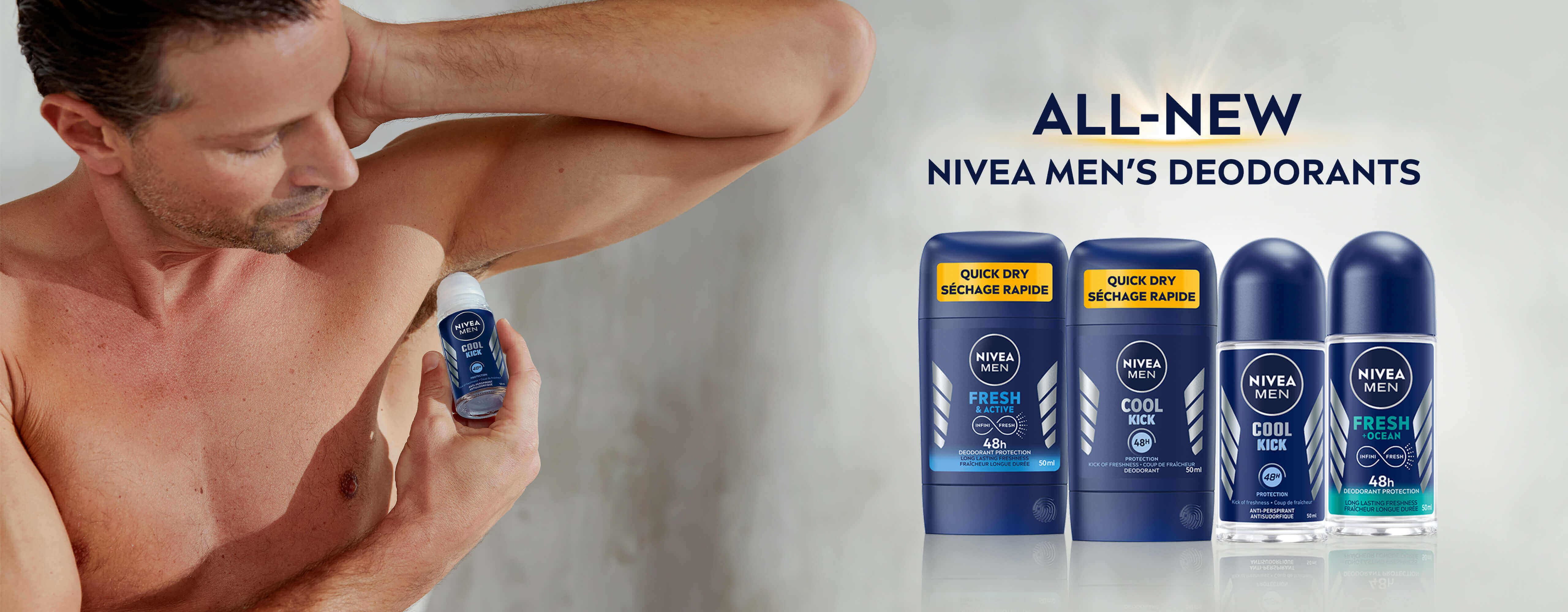 View of a shirtless person applying Nivea Men deodorant to their underarm.