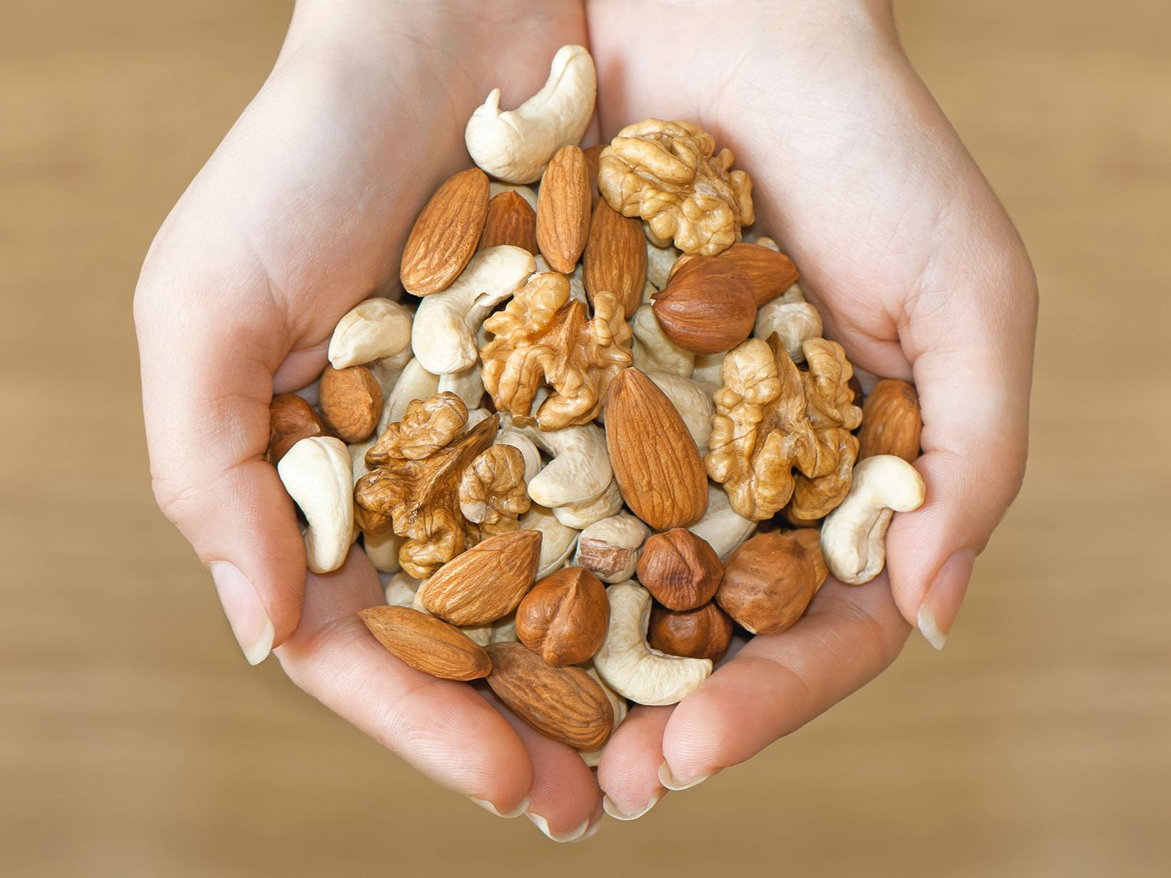 various-nuts-in-hands