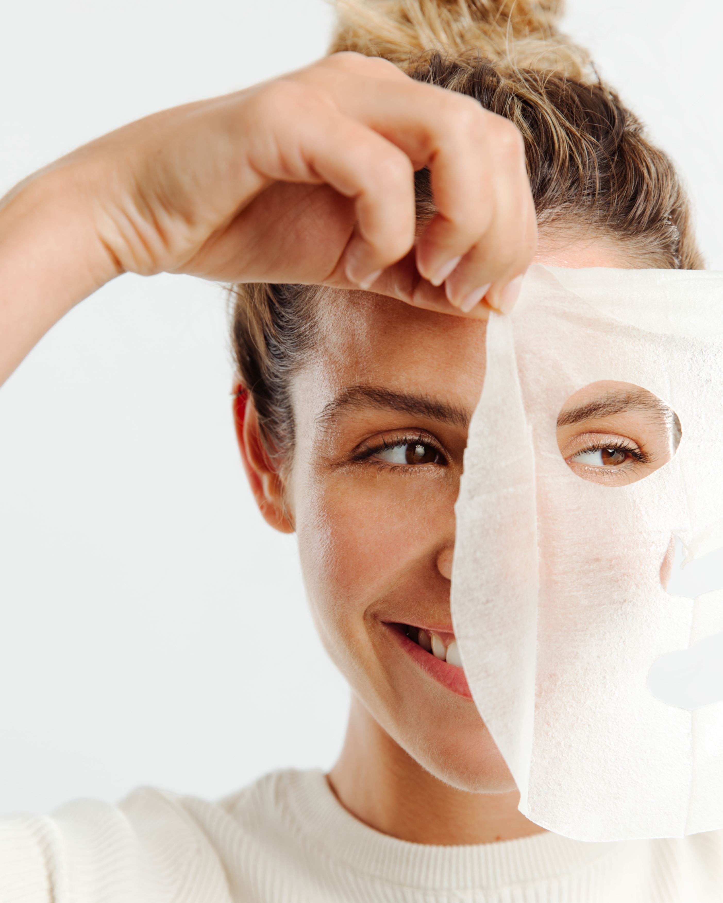 woman using a Nivea face mask