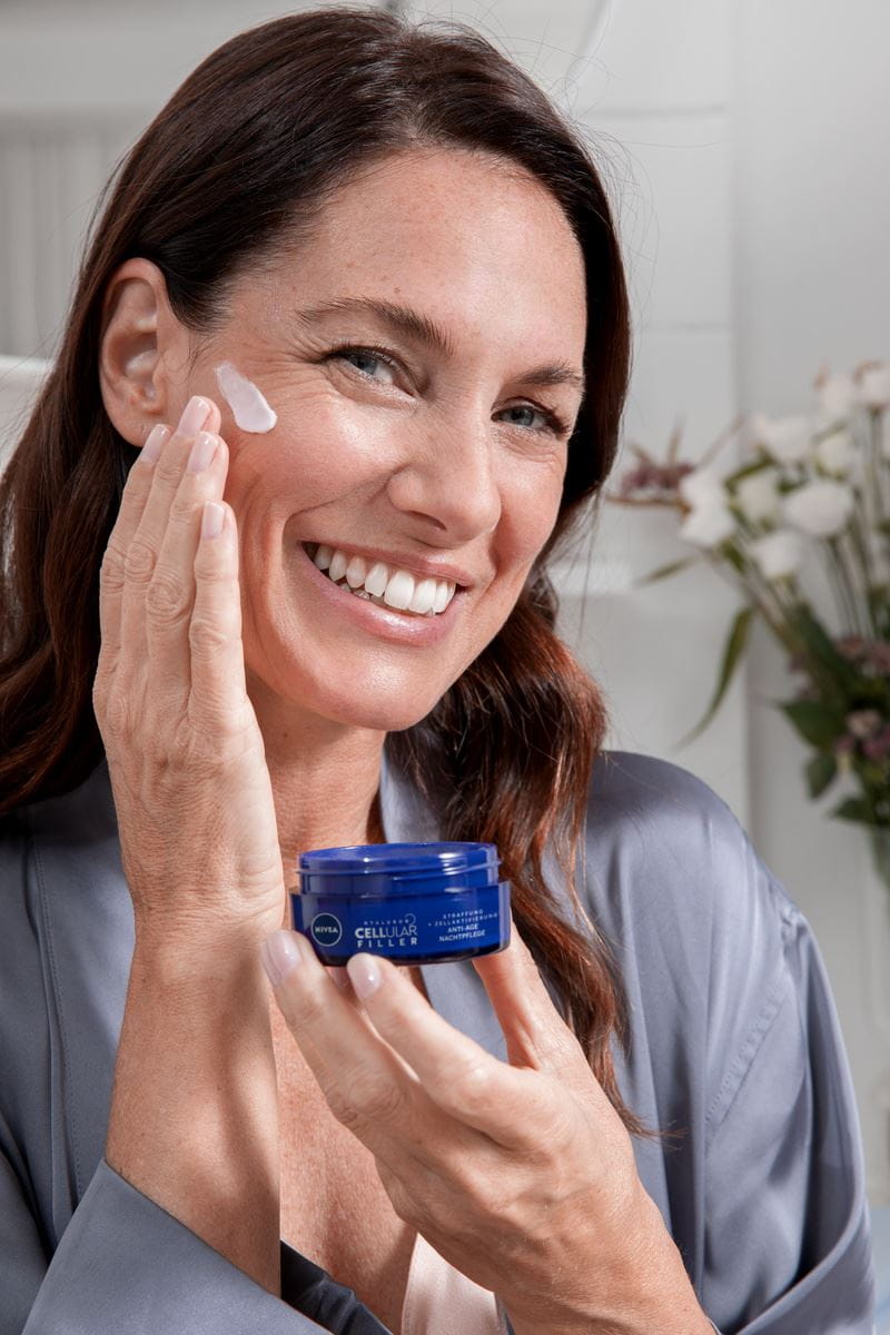 woman using  Nivea Cellular cream