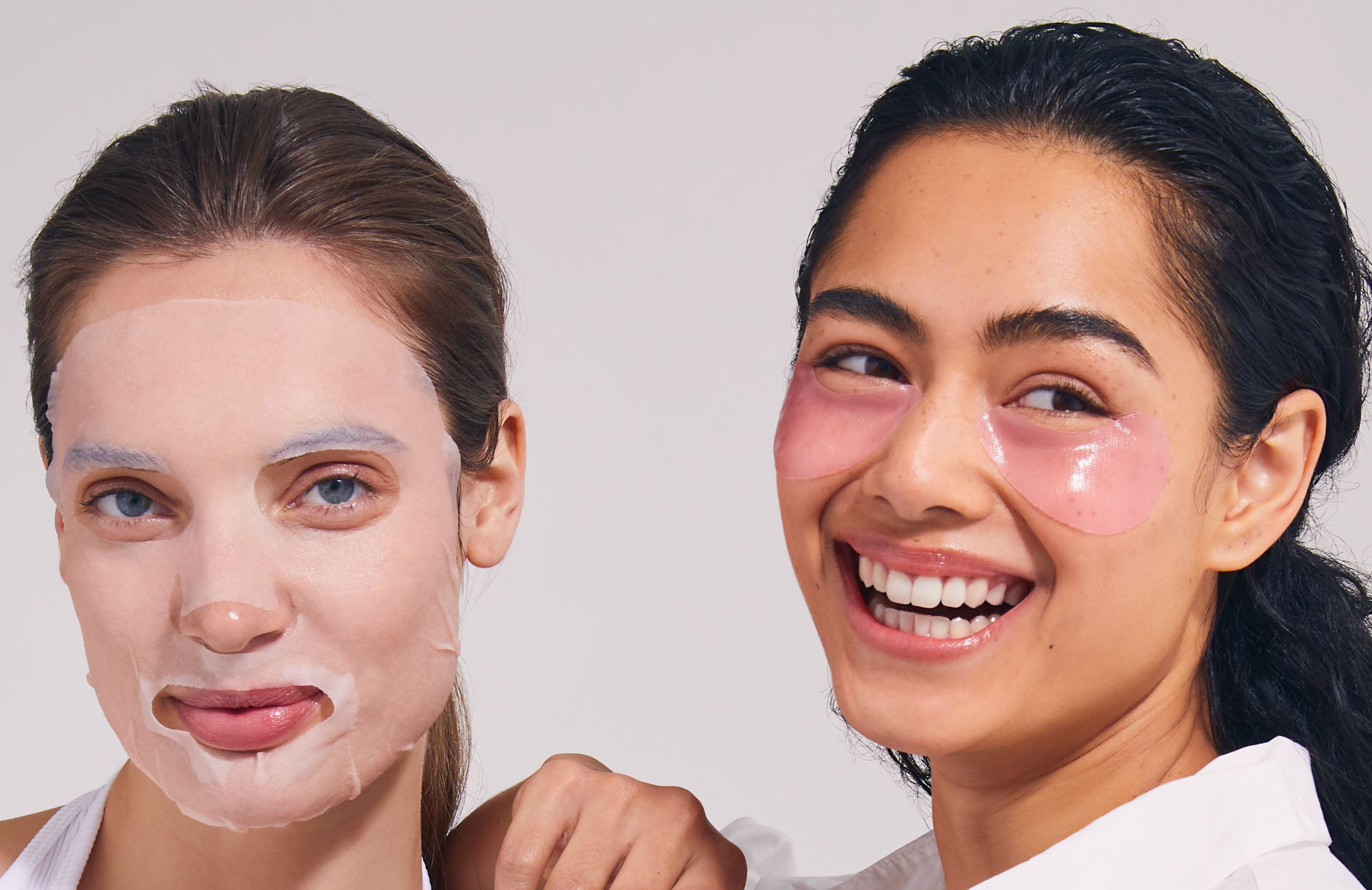 two women removing blemishes