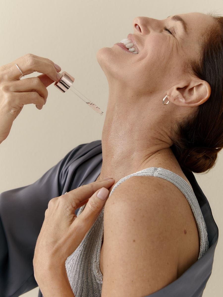 woman applying Nivea serum