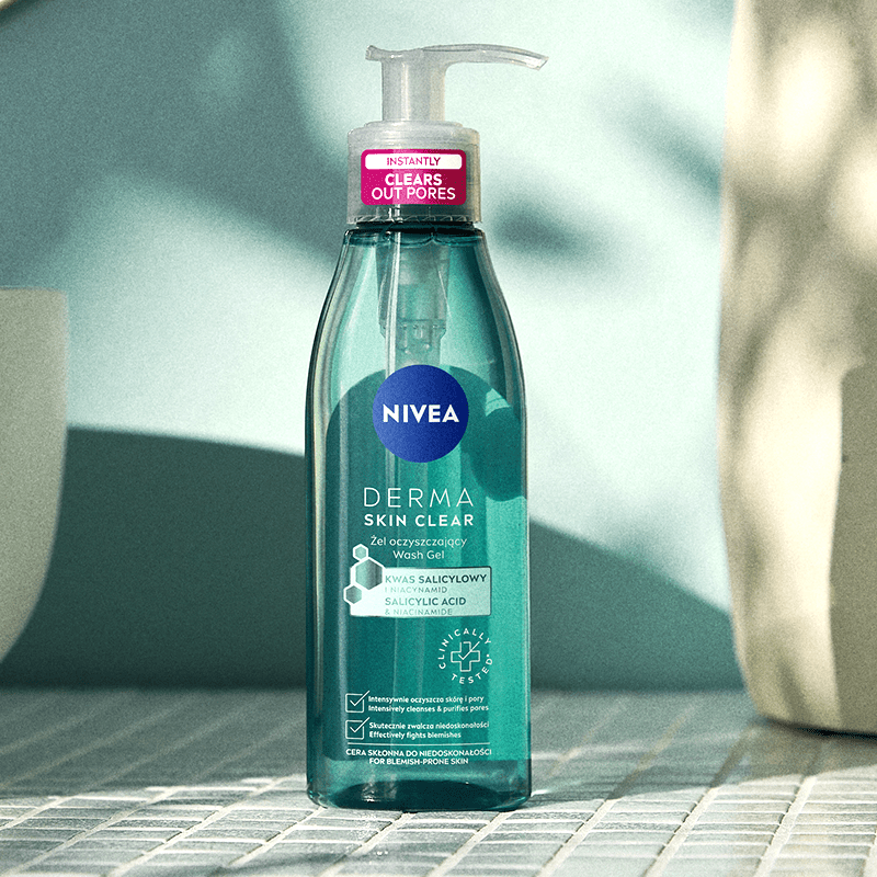 Nivea Skin Clear Wash Gel sitting on a tile bathroom counter next to a sink.