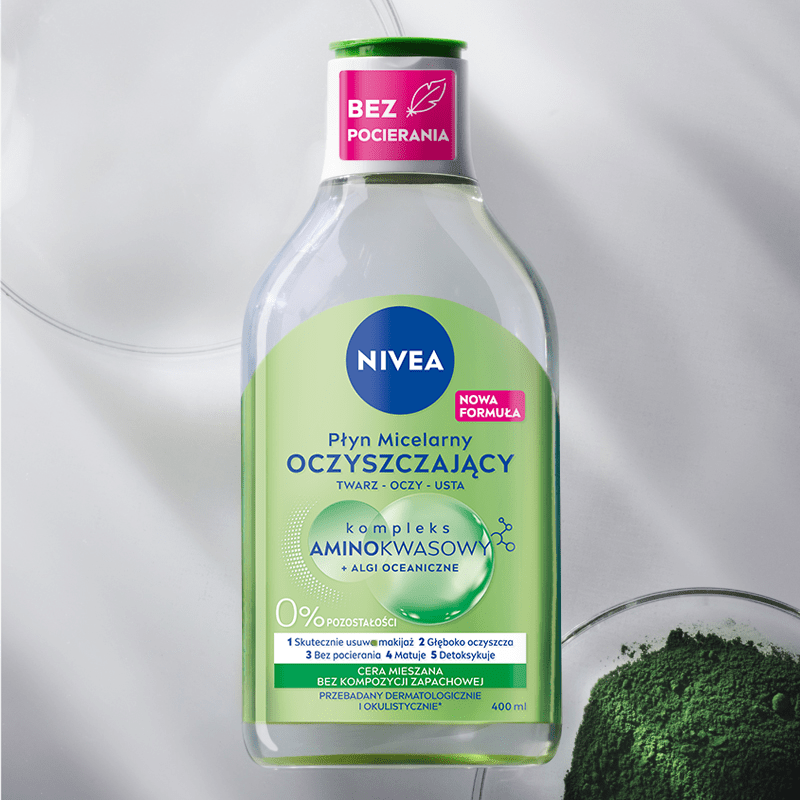 A bottle of NIVEA Micellar Water for Combination Skin lays on a green bubble textured background.