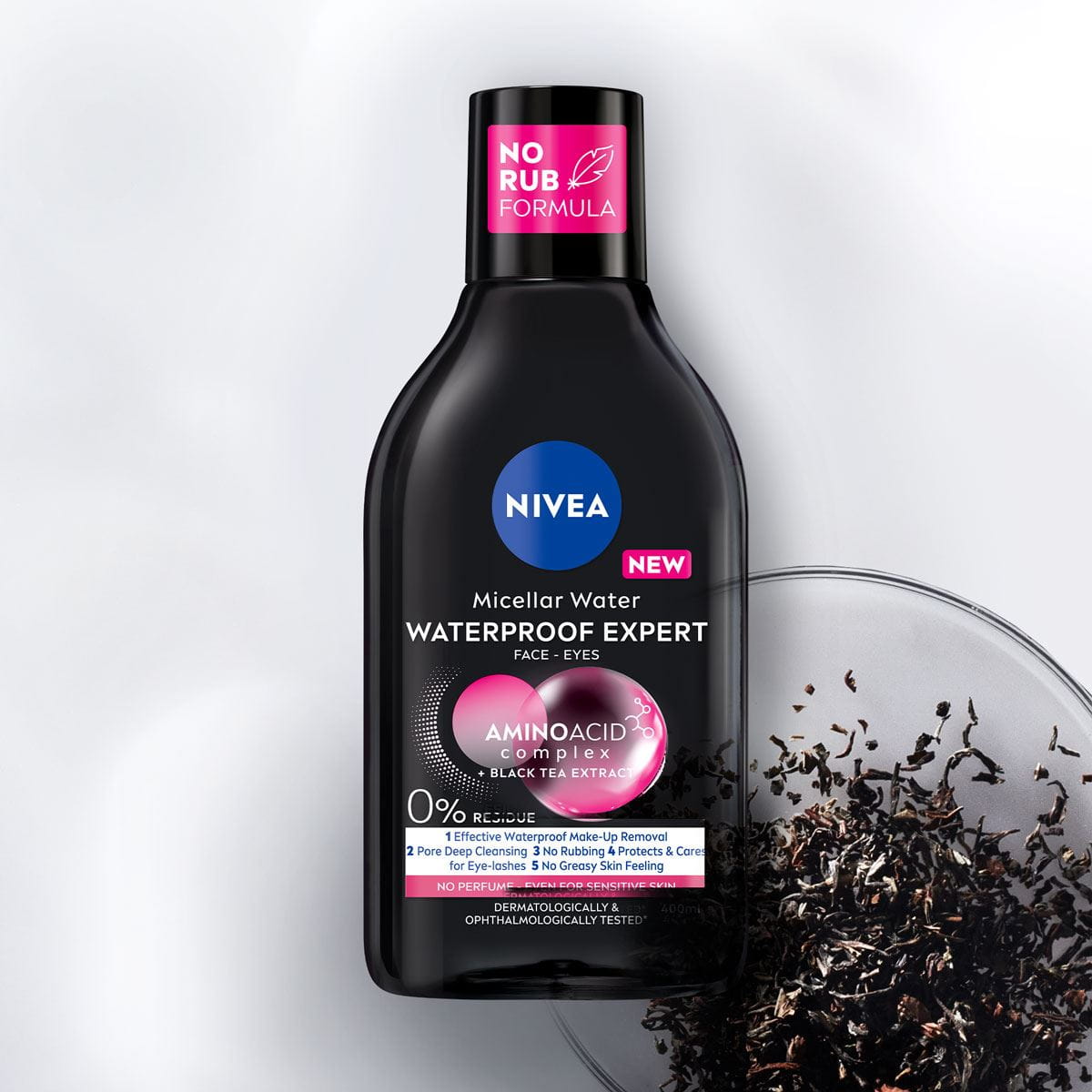 A bottle of NIVEA Micellar Water for Normal Skin lays on a blue bubble textured background.